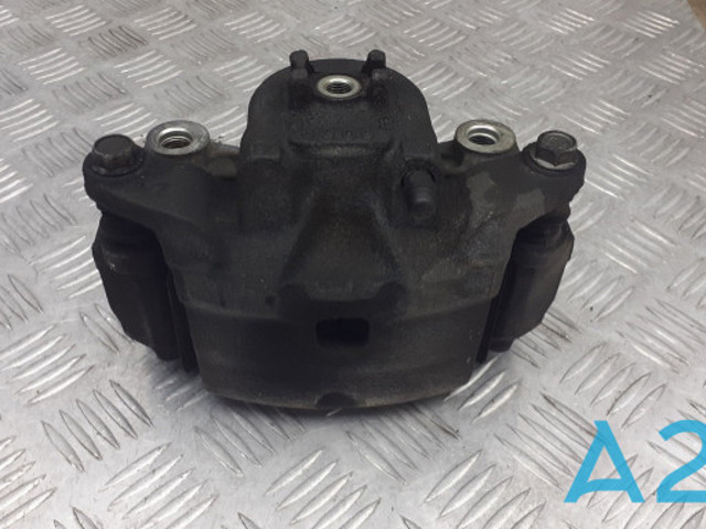 Супорт гальмівний, передній, лівий 410113TA0A NISSAN