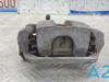 Супорт гальмівний, задній, лівий 440113NK0A NISSAN