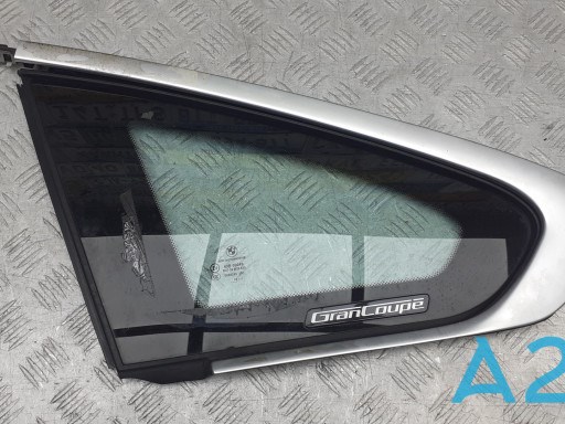 Скло багажного відсіку, ліве 51377412021 BMW