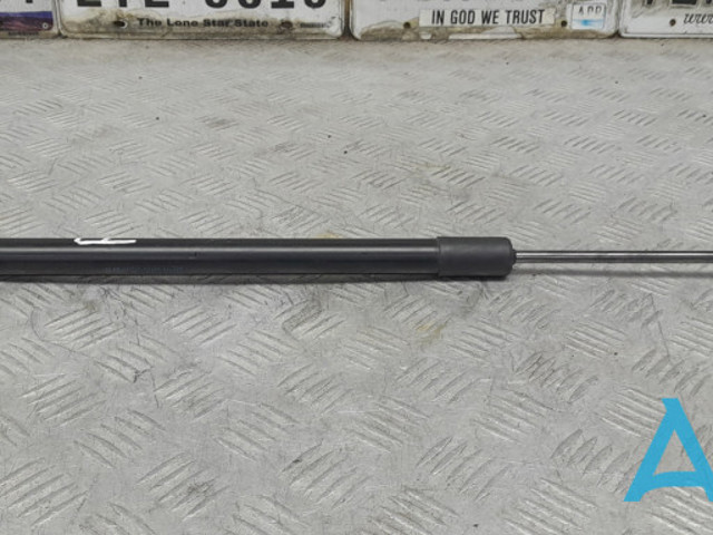 Амортизатор багажника лівий 5NA827550B VAG