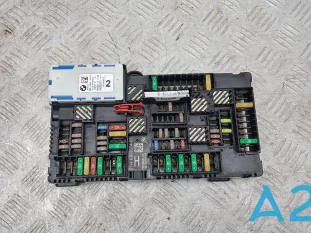 Блок запобіжників задній, салонний 61146828074 BMW