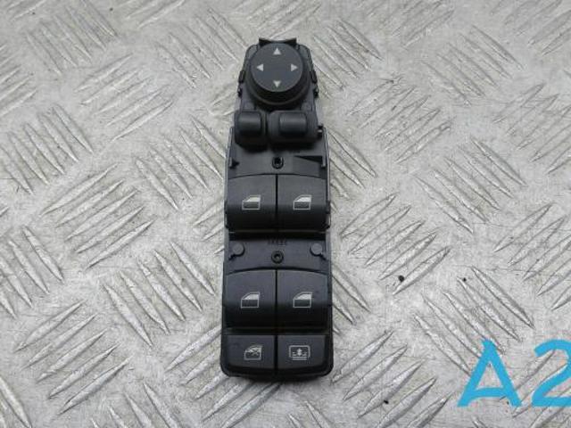 Кнопки переднього лівого склопід'ємника 61319241956 BMW