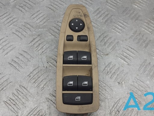 Кнопки переднього лівого склопід'ємника 61319362107 BMW