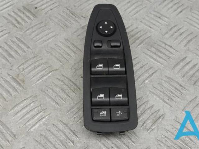 Кнопки переднього лівого склопід'ємника 61319362120 BMW