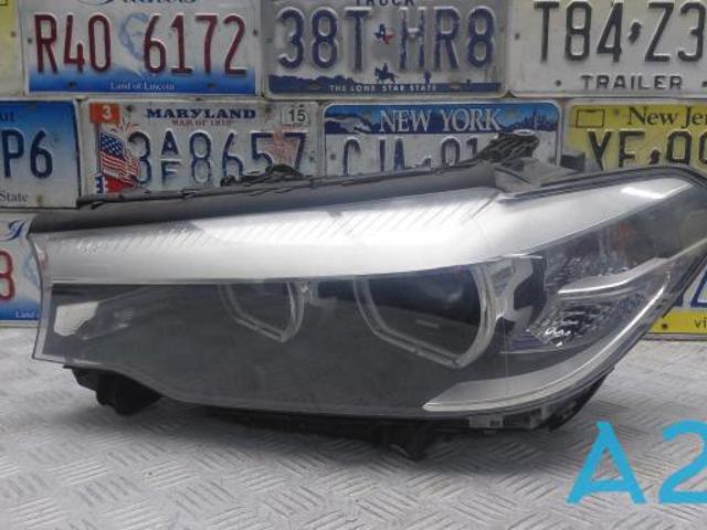 Фара ліва 63117214959 BMW