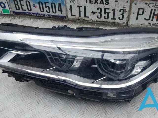 Фара ліва 63117408705 BMW