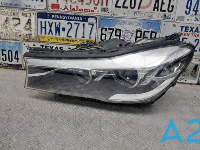 Основна фара в зборі ліва 63117408711 BMW