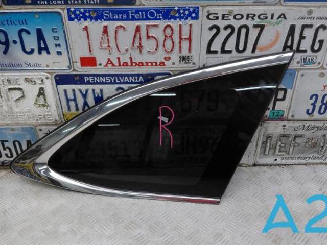 Скло багажного відсіку, праве 65209AN02A SUBARU