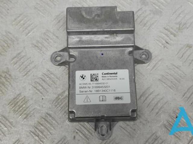 Блок управління airbag 65776994532 BMW