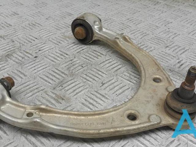 Важіль передньої підвіски верхній, лівий/правий 7P0407021 VAG