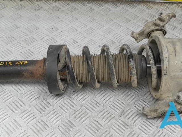 Стійка амортизатора задня 7P6513029BA VAG