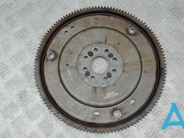 Маховик із зубчастим ободом в зборі 7T4Z6375AA FORD