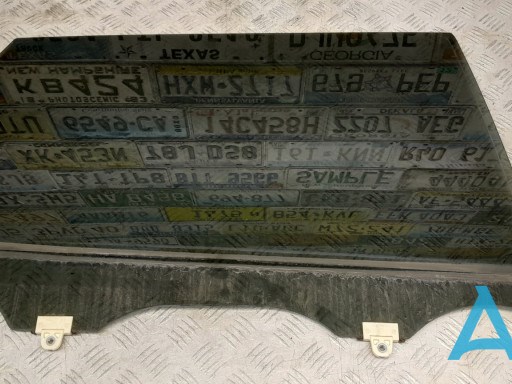 Скло задньої двері правої 823005HA0B NISSAN
