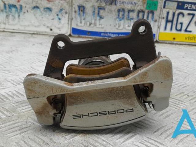 Супорт гальмівний задній правий 95B615424D PORSCHE