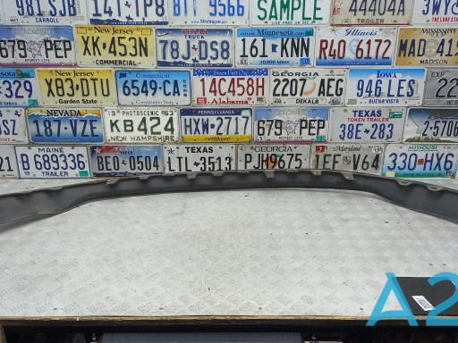 Губа переднього бампера 960155AA0A NISSAN