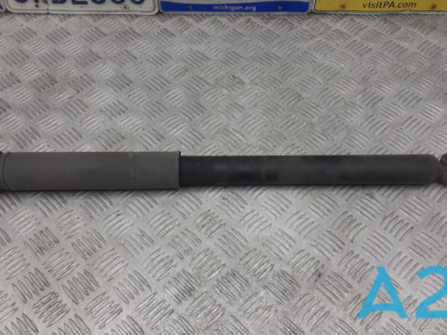 Стійка амортизатора задня BV6Z18125A FORD