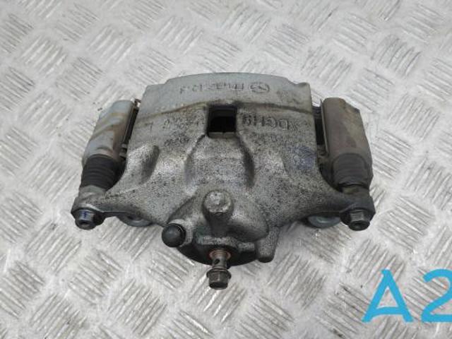 Супорт гальмівний, передній, лівий DGY93399Z MAZDA