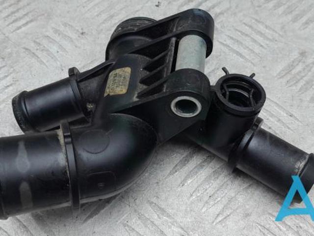 Водяний патрубок DS7Z8K556G FORD