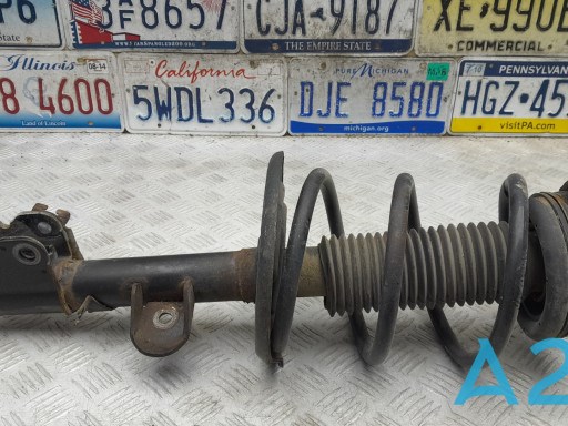 Ліва передня стійка E43033JV0B NISSAN