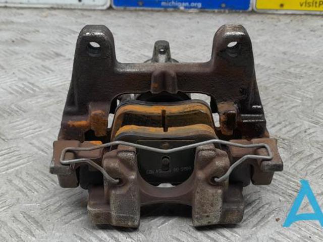 Супорт гальмівний задній правий F2GZ2552A FORD