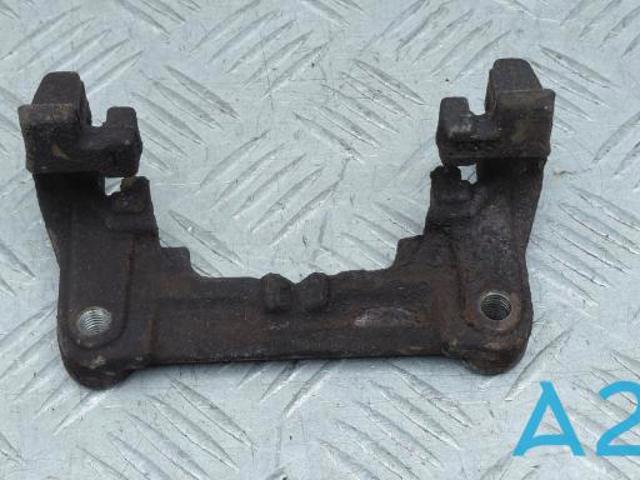 Скоба супорту заднього JX6Z2B511F FORD