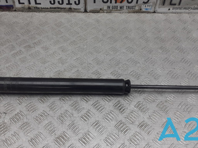 Амортизатор задньої підвіски KN1C28700A MAZDA