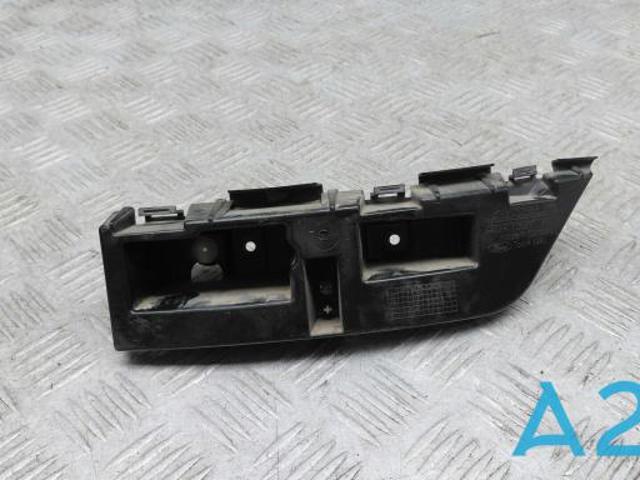 Кронштейн бампера заднього, правий KT4Z17D942A FORD