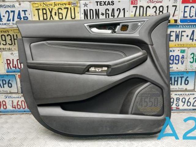 Обшивка дверей передніх лівих KT4Z5823943CC FORD