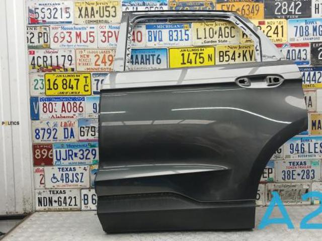 Двері задні, ліві KT4Z5824631B FORD