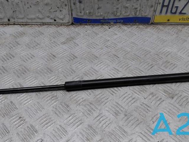 Амортизатор двері задньої KT4Z58406A11A FORD