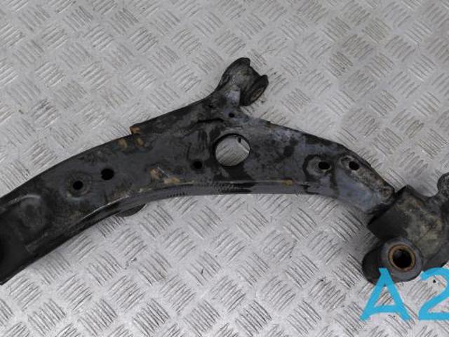 Правий важіль передній нижній підвіски TC3M34300A MAZDA