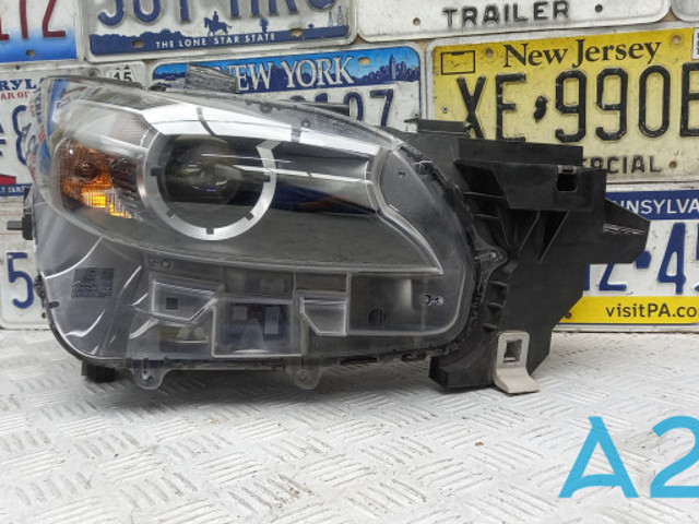 Основна фара - вставка TK5051030 MAZDA