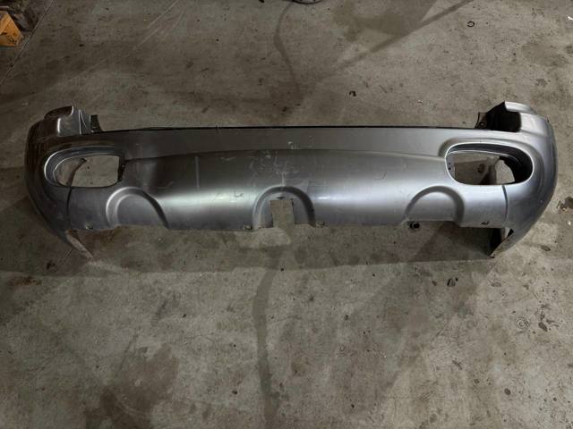 Бампер задній 8661026900 HYUNDAI
