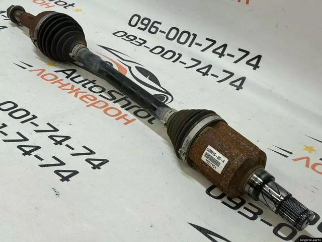 Піввісь передня ліва 103061500A TESLA