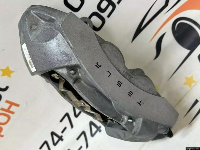 Супорт гальмівний, передній, лівий 134462100A TESLA