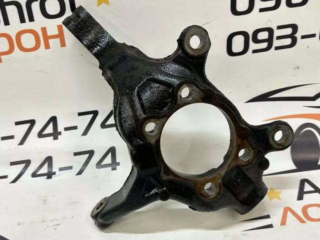 Цапфа поворотного кулака 400141KA1A NISSAN