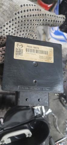 Модуль управління (ЕБУ) бортової мережі PE0318572 MAZDA