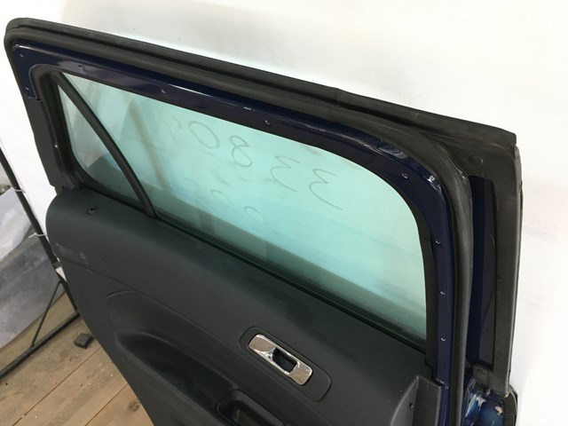Прокладка дверей задніх, лівих (на двері) BB5Z7825325A FORD