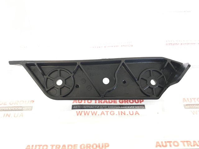 Кронштейн бампера переднього, зовнішній лівий HS7Z17C947AB MARKET (OEM)