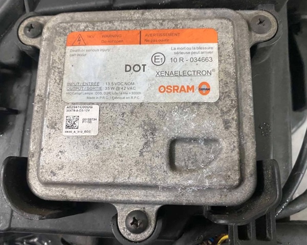 Блок управління фарами 10R034663 GM
