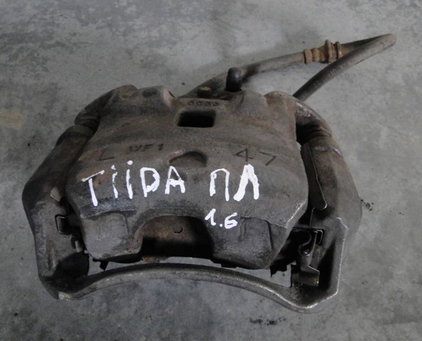 Супорт гальмівний, передній, лівий 410111FE0A NISSAN