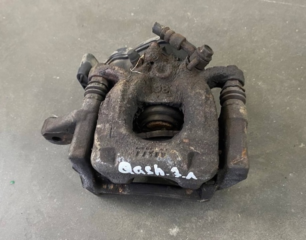 Задній гальмівний супорт лівий 440114EA0A NISSAN