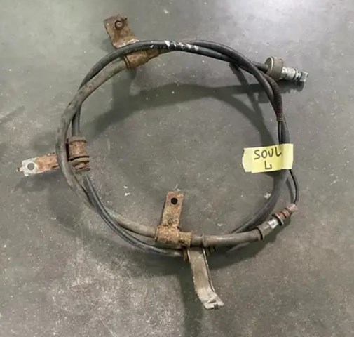 Трос ручного гальма задній, лівий 597602K000 HYUNDAI