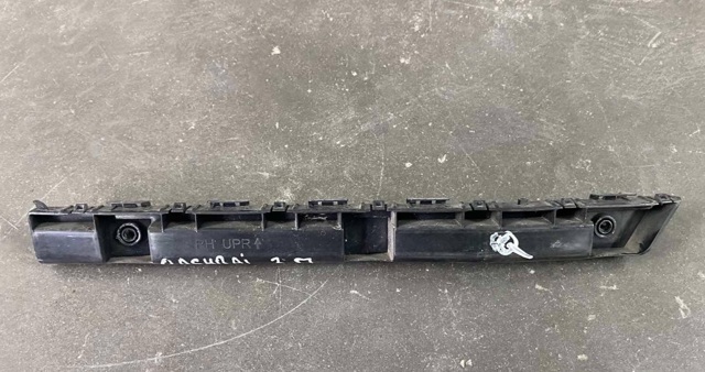 Кронштейн бампера переднього, правий 852204EA0A NISSAN