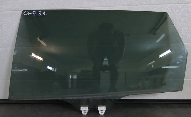 Скло задньої двері лівої TD1173510 MAZDA