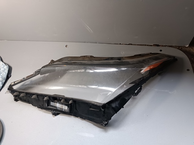Блок фара ліва 8117148D40 TOYOTA