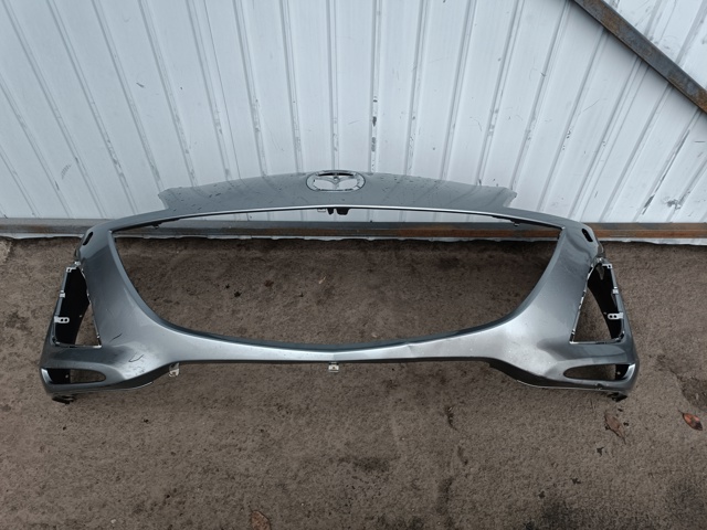 Кожух бампера переднього BBN250031 MAZDA