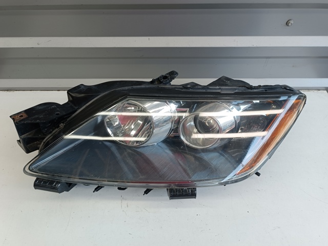 Фара основна ліва EG21510L0K MAZDA