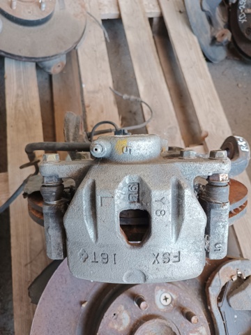Супорт тормзной F1Z73399Z MAZDA