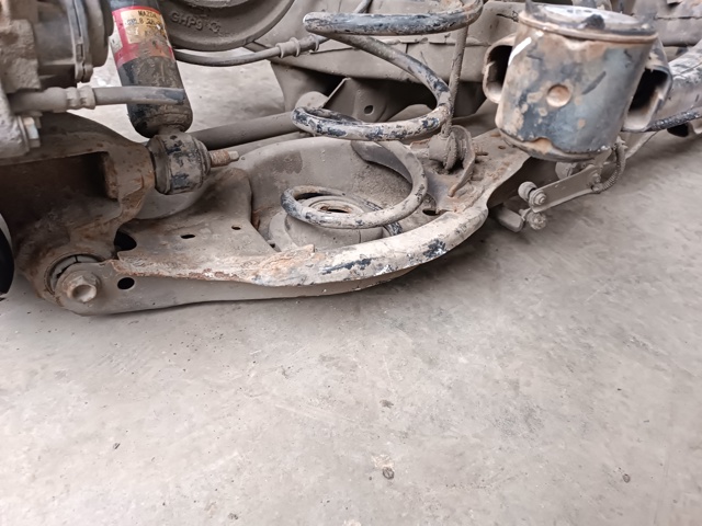 Балансир задній лівий GHP928350 MAZDA